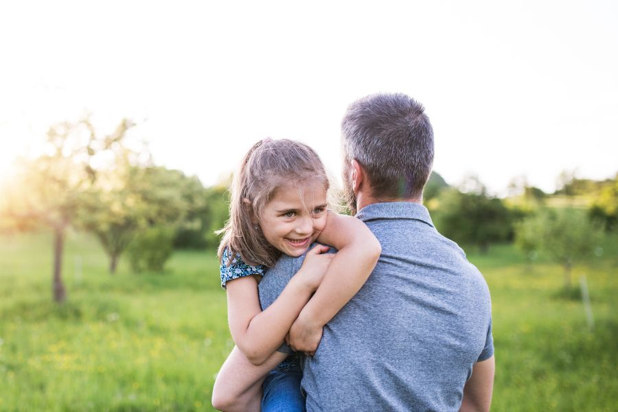 Dad and smiling daughter_L Post Adoption Support and Accessing Adoption Records